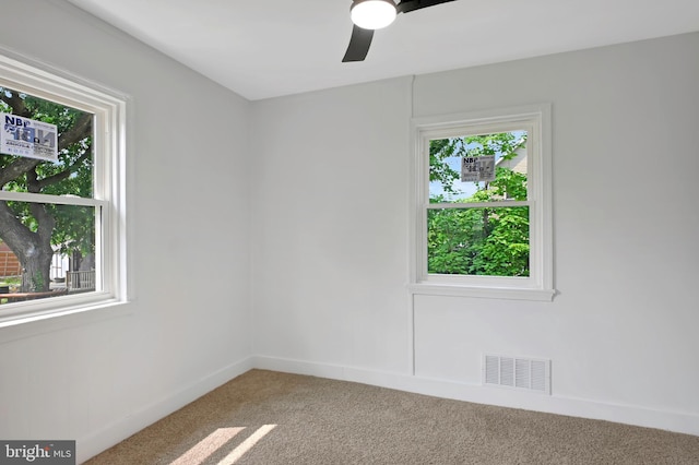4504 Clay St NE, Washington, DC 20019 - empty room featuring light carpet and a ceiling fan