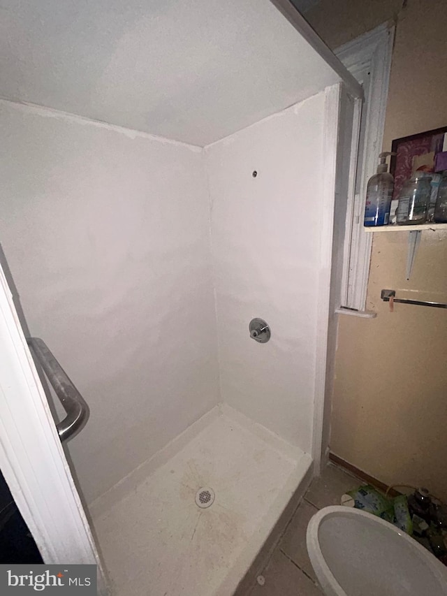 2844 N Hancock St, Philadelphia, PA 19133 - bathroom featuring a shower stall, toilet, and tile patterned floors