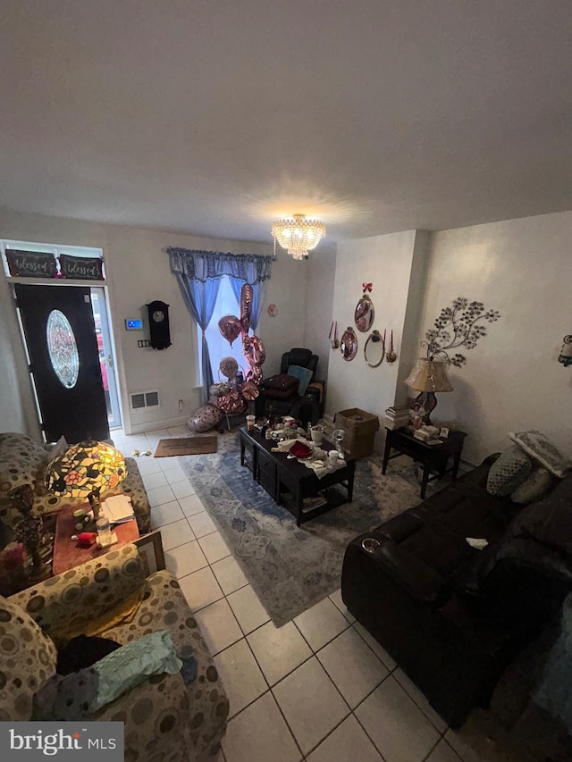 2844 N Hancock St, Philadelphia, PA 19133 - living room featuring light tile patterned floors and a chandelier