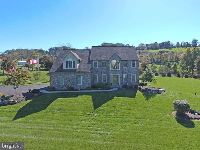 4408 Irish Creek Rd, Bernville, PA 19506 - colonial-style house with stone siding and a front yard