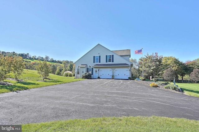 4408 Irish Creek Rd, Bernville, PA 19506 - view of front of house with an attached garage, driveway, and a front lawn