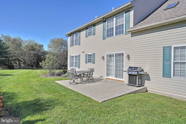 4408 Irish Creek Rd, Bernville, PA 19506 - rear view of property featuring a lawn, a patio, and a shingled roof