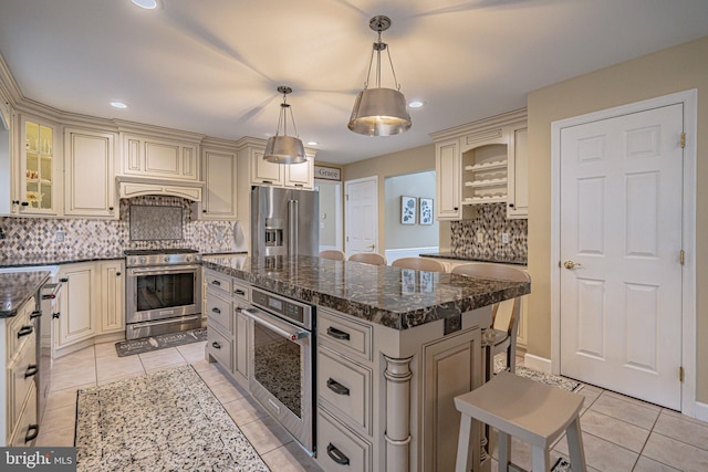 4408 Irish Creek Rd, Bernville, PA 19506 - kitchen with appliances with stainless steel finishes, cream cabinetry, light tile patterned floors, and recessed lighting