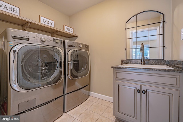 4408 Irish Creek Rd, Bernville, PA 19506 - washroom with washing machine and clothes dryer, cabinet space, light tile patterned floors, and baseboards