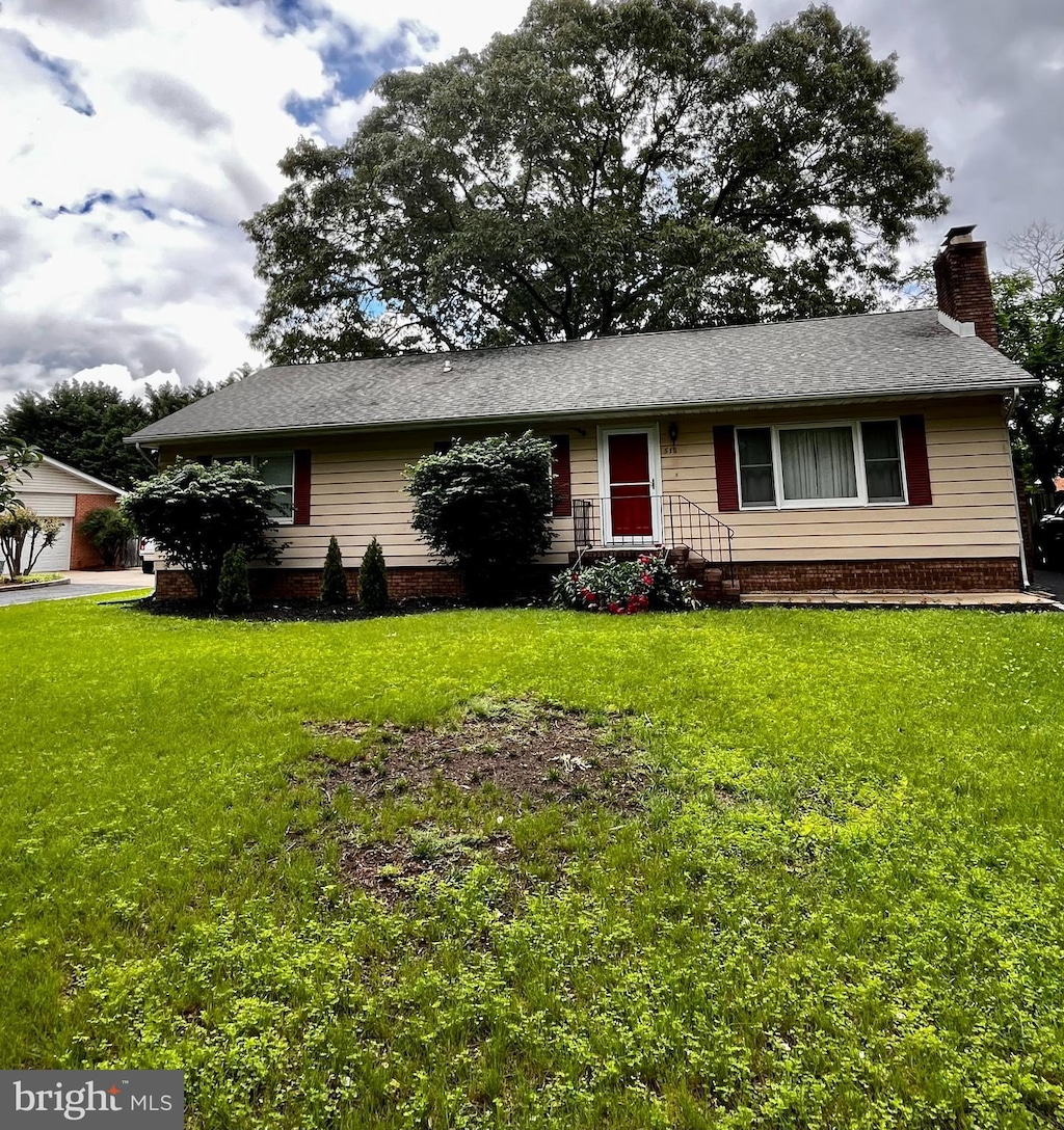 518 Laurel Rd, Riva, MD 21140 - view of front of property featuring a front yard and a chimney