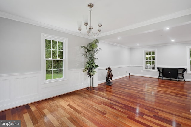 10401 Zion Dr, Fairfax, VA 22032 - unfurnished living room with wood finished floors, a chandelier, wainscoting, recessed lighting, and ornamental molding