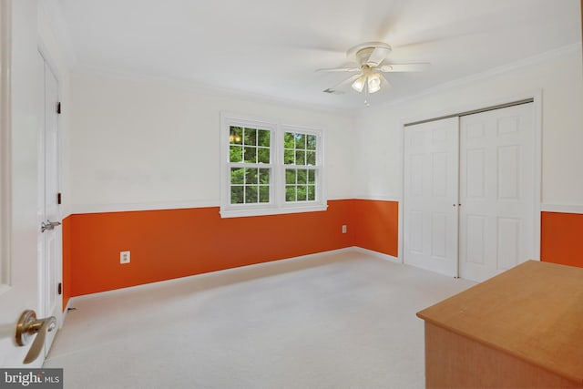 10401 Zion Dr, Fairfax, VA 22032 - unfurnished bedroom with carpet floors, crown molding, a closet, and a ceiling fan