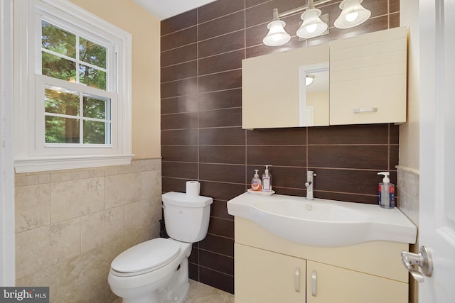 10401 Zion Dr, Fairfax, VA 22032 - bathroom with tile walls, vanity, and toilet