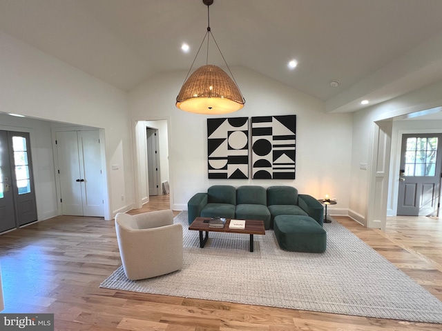 3200 Winnett Rd, Chevy Chase, MD 20815 - living room with baseboards, light wood-style flooring, recessed lighting, and high vaulted ceiling