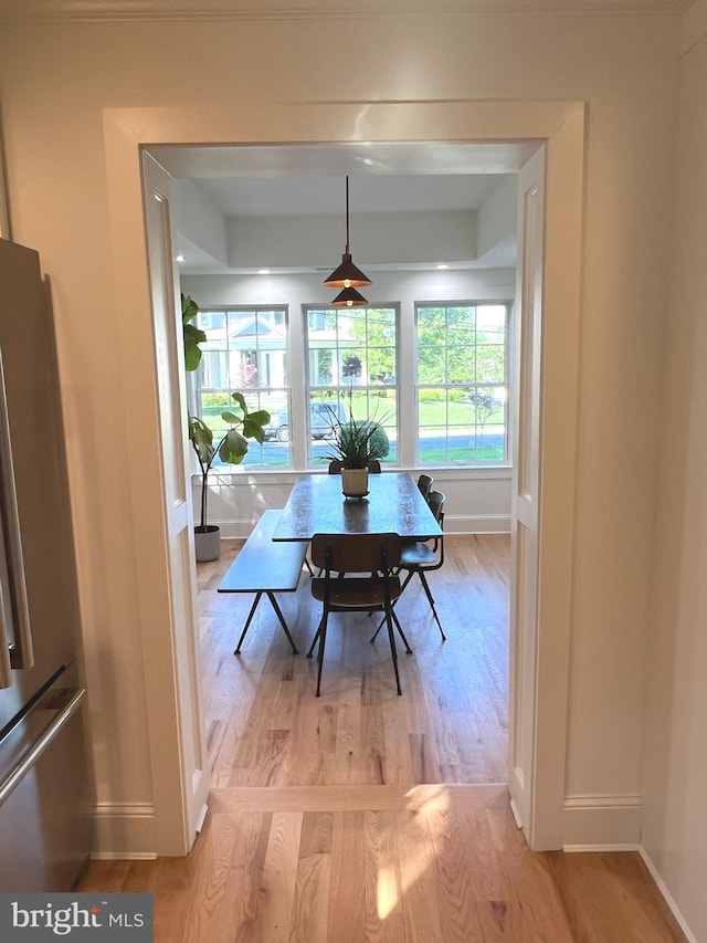 3200 Winnett Rd, Chevy Chase, MD 20815 - dining area featuring baseboards and light wood-style floors