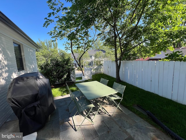 3200 Winnett Rd, Chevy Chase, MD 20815 - view of patio with outdoor dining space and a grill