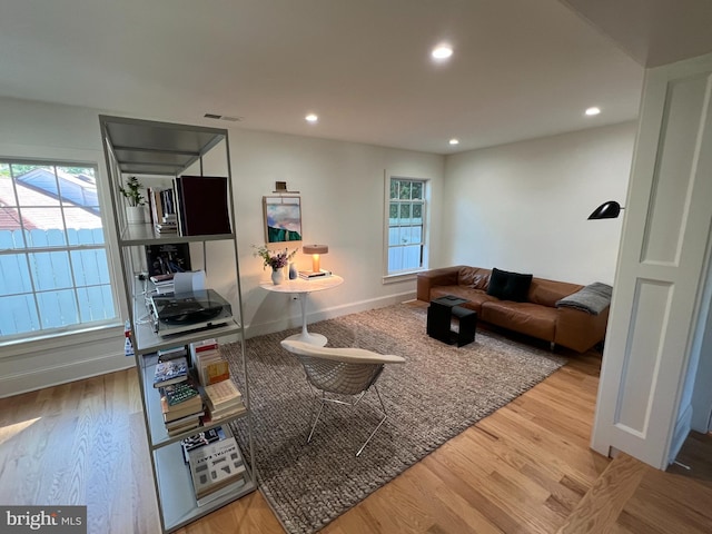 3200 Winnett Rd, Chevy Chase, MD 20815 - living room with wood finished floors, recessed lighting, and baseboards