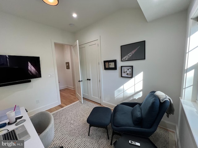 3200 Winnett Rd, Chevy Chase, MD 20815 - living room with wood finished floors, baseboards, and recessed lighting