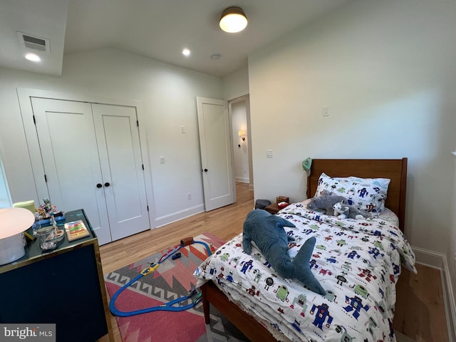 3200 Winnett Rd, Chevy Chase, MD 20815 - bedroom featuring wood finished floors, baseboards, a closet, lofted ceiling, and recessed lighting