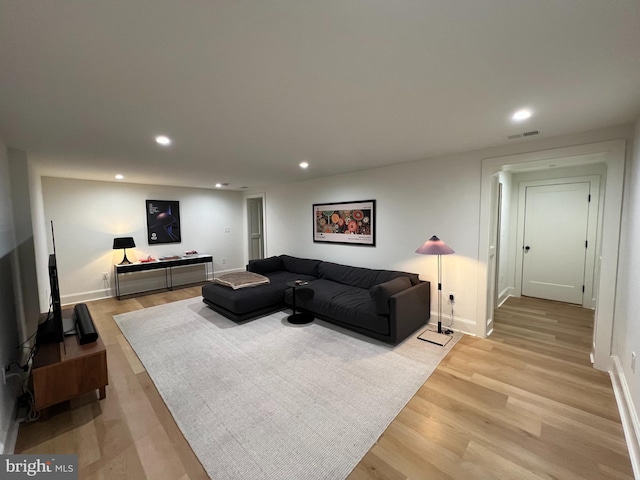 3200 Winnett Rd, Chevy Chase, MD 20815 - living area featuring recessed lighting, light wood-style floors, and baseboards
