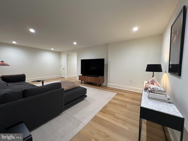 3200 Winnett Rd, Chevy Chase, MD 20815 - living room featuring recessed lighting, light wood-type flooring, and baseboards