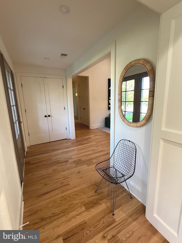 3200 Winnett Rd, Chevy Chase, MD 20815 - hallway with light wood-type flooring and baseboards