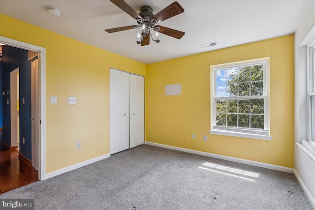 109 Water Fountain Way Unit 304, Glen Burnie, MD 21060 - unfurnished bedroom featuring carpet flooring, baseboards, a closet, and a ceiling fan