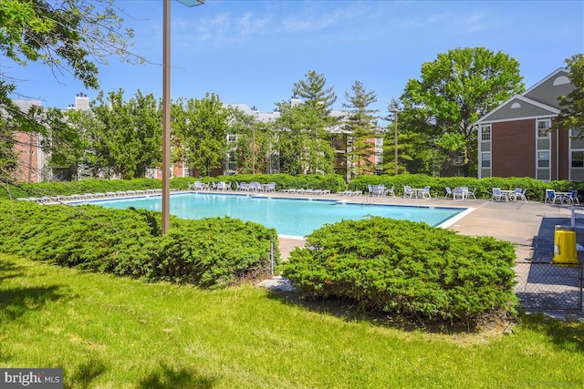 109 Water Fountain Way Unit 304, Glen Burnie, MD 21060 - community pool featuring a yard