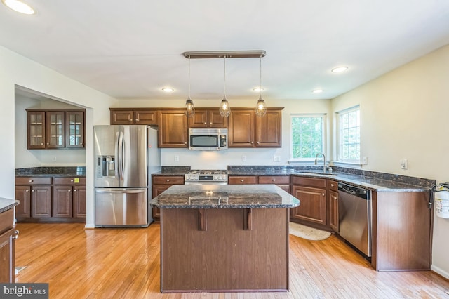 102 Helen Dr, Cinnaminson, NJ 08077 - kitchen featuring appliances with stainless steel finishes, a sink, a kitchen island, light wood-style floors, and recessed lighting