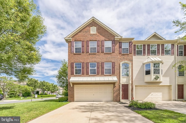 102 Helen Dr, Cinnaminson, NJ 08077 - townhome / multi-family property featuring concrete driveway, a garage, and brick siding