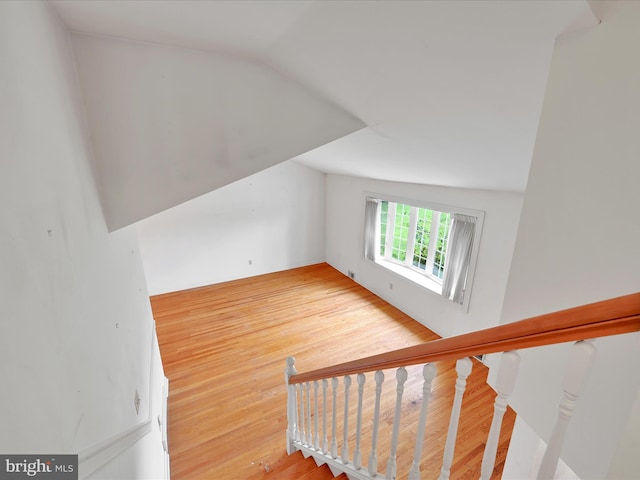 1122 Sheffield Dr, Berwyn, PA 19312 - staircase with vaulted ceiling and wood finished floors