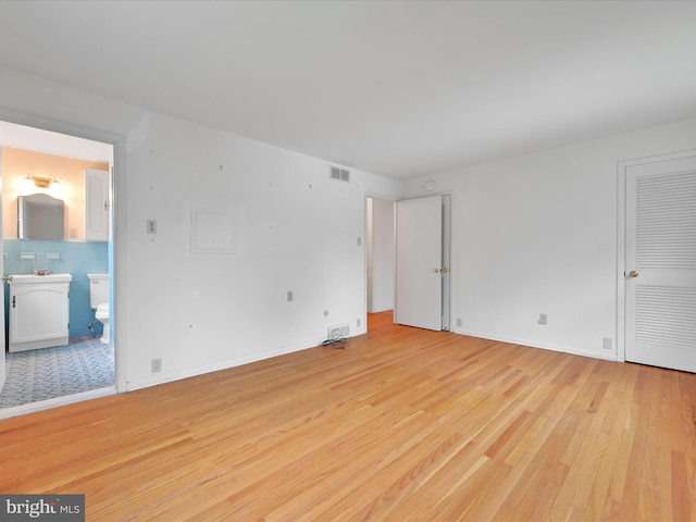 1122 Sheffield Dr, Berwyn, PA 19312 - empty room with light wood-style floors and baseboards