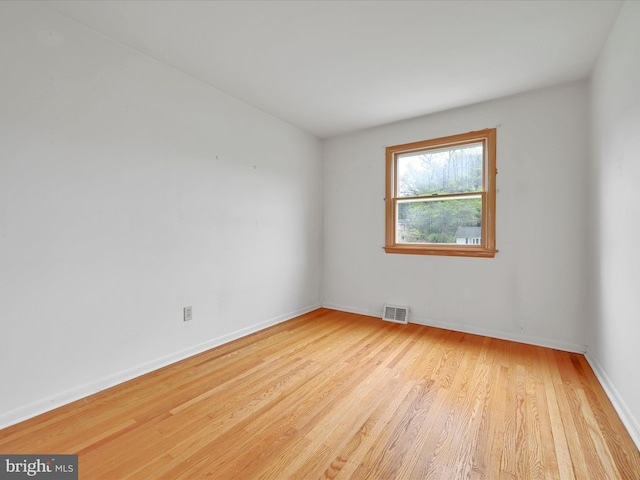 1122 Sheffield Dr, Berwyn, PA 19312 - empty room with wood finished floors and baseboards