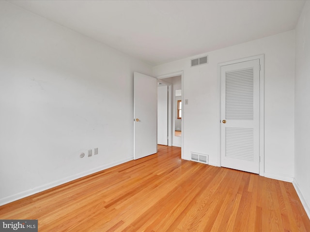 1122 Sheffield Dr, Berwyn, PA 19312 - unfurnished bedroom with wood finished floors, baseboards, and a closet