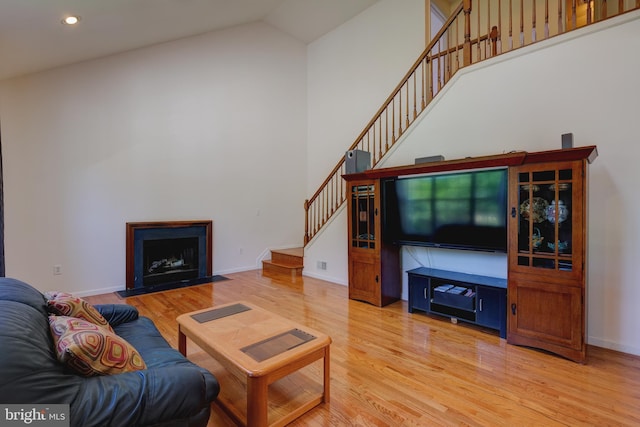 5 Pierce Rd, East Windsor, NJ 08520 - living area featuring stairway, wood finished floors, high vaulted ceiling, baseboards, and recessed lighting