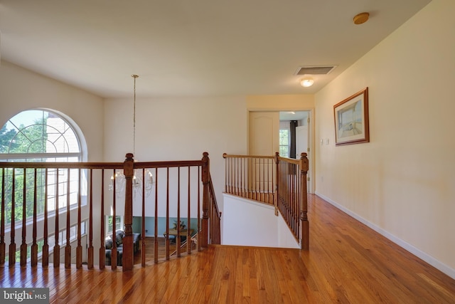 5 Pierce Rd, East Windsor, NJ 08520 - hallway with an upstairs landing, wood finished floors, and baseboards