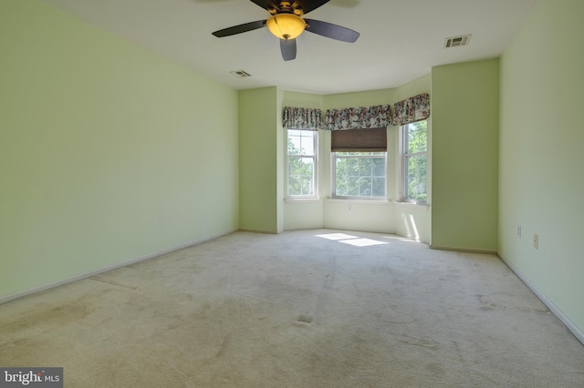 5 Pierce Rd, East Windsor, NJ 08520 - carpeted spare room with a ceiling fan and baseboards