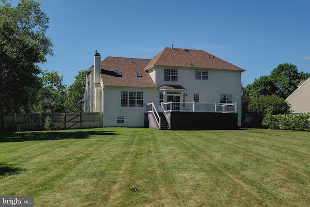 5 Pierce Rd, East Windsor, NJ 08520 - rear view of house with a wooden deck, stairway, and a chimney