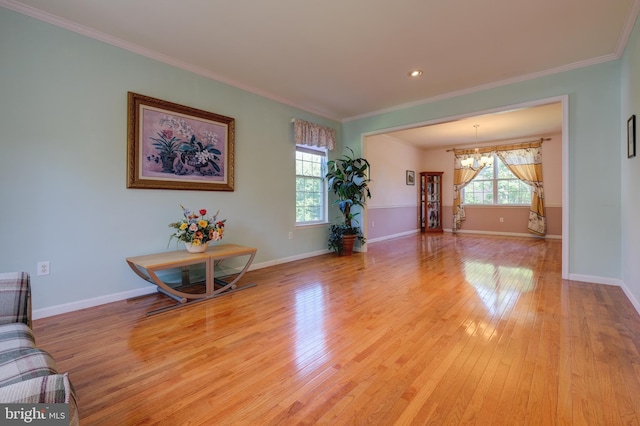 5 Pierce Rd, East Windsor, NJ 08520 - living area with a chandelier, light wood-type flooring, crown molding, baseboards, and recessed lighting