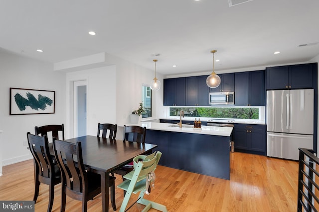 407 Salmon St, Philadelphia, PA 19125 - dining area featuring light wood-type flooring and recessed lighting