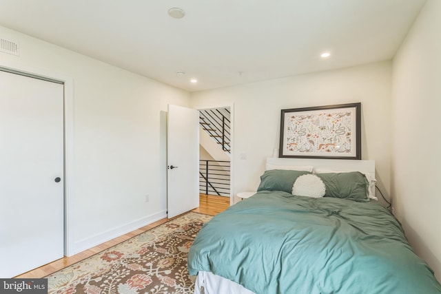 407 Salmon St, Philadelphia, PA 19125 - bedroom with wood finished floors and recessed lighting