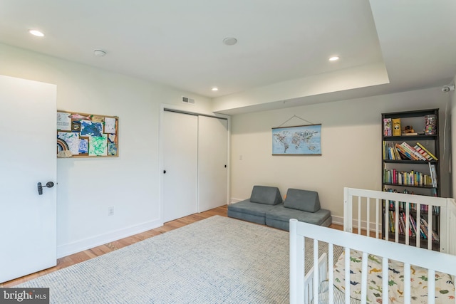 407 Salmon St, Philadelphia, PA 19125 - bedroom featuring wood finished floors, baseboards, recessed lighting, and a closet