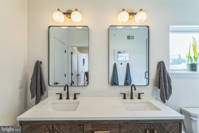 407 Salmon St, Philadelphia, PA 19125 - full bathroom with double vanity and toilet