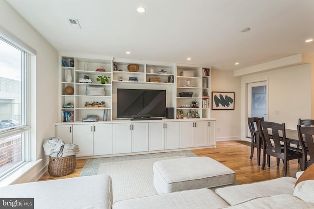 407 Salmon St, Philadelphia, PA 19125 - living area featuring light wood-style flooring, baseboards, and recessed lighting