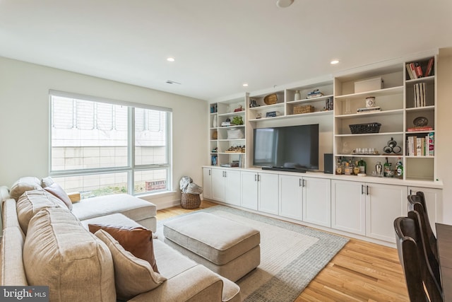 407 Salmon St, Philadelphia, PA 19125 - living area with light wood-style flooring and recessed lighting
