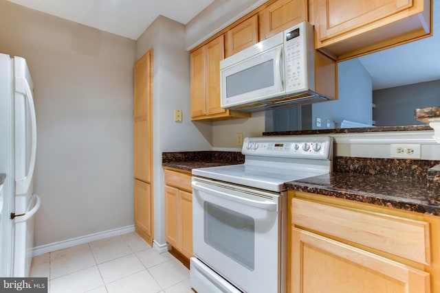 1525 Lincoln Way Unit 301A, Mclean, VA 22102 - kitchen with white appliances, light tile patterned floors, baseboards, light brown cabinetry, and dark stone counters