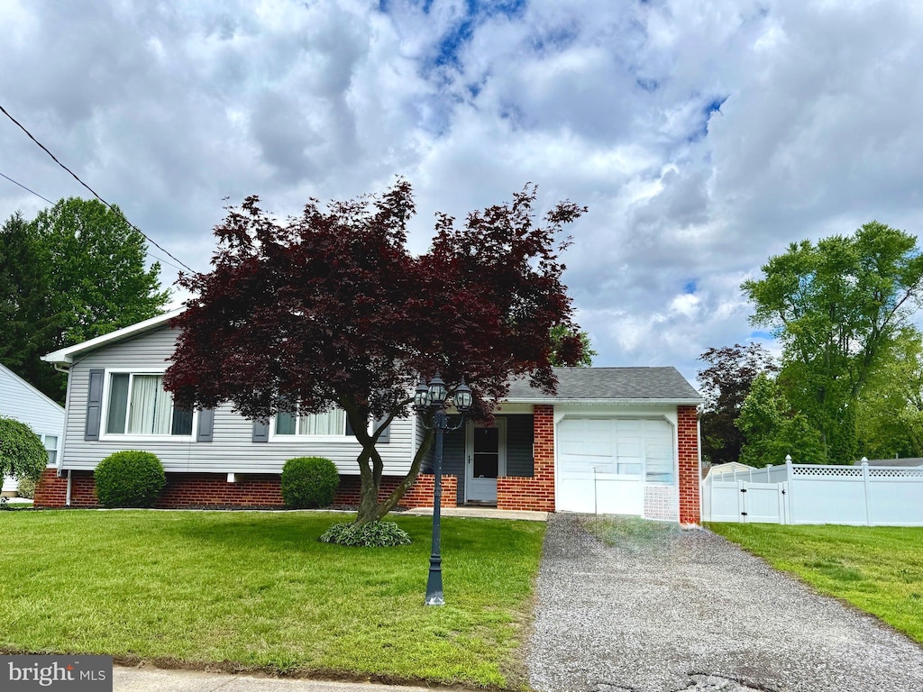 18 Forrest Dr, Turnersville, NJ 08012 - view of front of house with a garage, a gate, and driveway