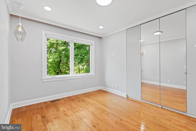 826 Suffolk Rd, Jenkintown, PA 19046 - unfurnished bedroom with baseboards, light wood finished floors, a closet, crown molding, and recessed lighting