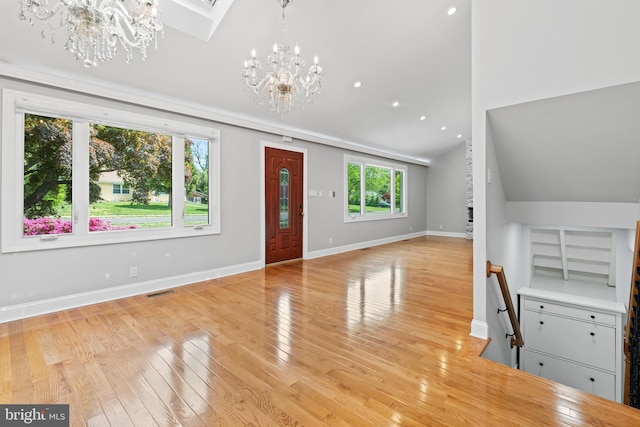 826 Suffolk Rd, Jenkintown, PA 19046 - foyer entrance with a chandelier, lofted ceiling, light wood-style flooring, and baseboards