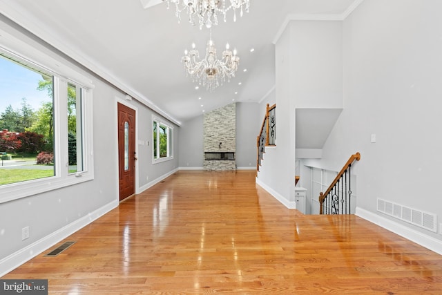 826 Suffolk Rd, Jenkintown, PA 19046 - entrance foyer featuring a chandelier, vaulted ceiling, light wood-type flooring, stairs, and baseboards