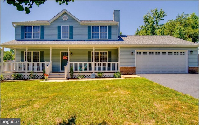 11714 Falcon Ridge Dr, Fredericksburg, VA 22407 - view of front of home featuring driveway, brick siding, a garage, a porch, and a front yard