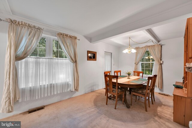 210 Pennsylvania Ave, Mount Gretna, PA 17064 - dining room with a chandelier, light colored carpet, and beamed ceiling