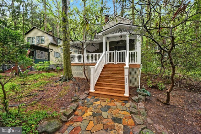 210 Pennsylvania Ave, Mount Gretna, PA 17064 - view of front of home featuring stairway and a chimney