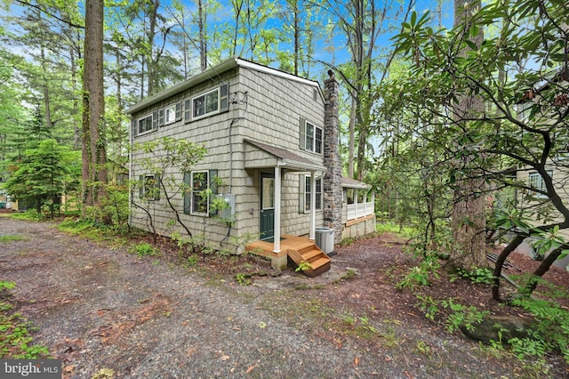 210 Pennsylvania Ave, Mount Gretna, PA 17064 - view of front of home featuring a chimney and cooling unit