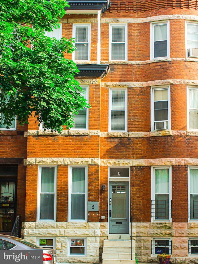 5E 27th St, Baltimore, MD 21218 - view of front of home featuring brick siding and stone siding